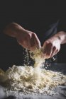 Cropped view of man making shortcrust pastry — Stock Photo