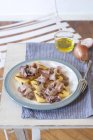 Polenta with squid on plate — Stock Photo