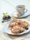 Mini blueberry pancakes — Stock Photo
