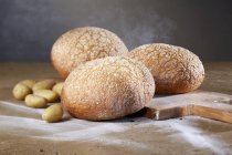 Potato and wheat loaves — Stock Photo