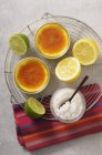 Top view of Creme Brulee with lemons and limes — Stock Photo