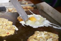 Fried eggs on roasting tray — Stock Photo