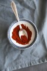 Paprika powder in bowl — Stock Photo