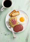 Fried egg, sausage and rice — Stock Photo