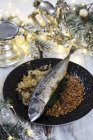 Closeup view of mackerel with white cabbage and grains for Christmas — Stock Photo