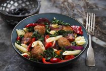 Penne pasta salad with meat balls — Stock Photo