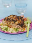 Grilled chicken served with couscous — Stock Photo