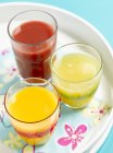 Three glasses of juice — Stock Photo