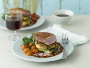 Duck breast on potato and kale fritters — Stock Photo