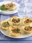 Filo pastry tartlets with a mushroom filling — Stock Photo