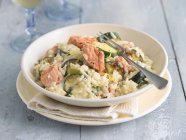 Salmon and courgette risotto rice — Stock Photo
