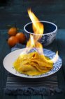 Crpe Suzette being flambed — Stock Photo
