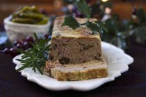 A festive goose liver terrine with mushrooms  on white plate — Stock Photo