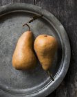 Boskop pears on pewter plate — Stock Photo