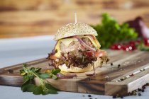 Mini hamburger with oak leaf — Stock Photo