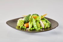 Plate of vegetables with Romanesco — Stock Photo