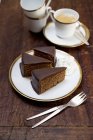 Chocolate cake with whipped cream — Stock Photo