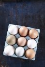 Fresh eggs in a box — Stock Photo