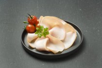 Turkey ham and tomatoes — Stock Photo