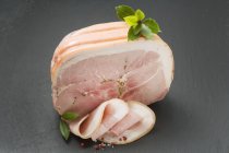 Sliced Truffle ham with herbs and spices — Stock Photo