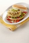 Fish burger with Emmental cheese — Stock Photo