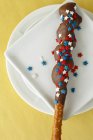 Chocolate-coated pretzel stick — Stock Photo