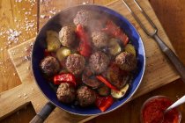Fried meatballs with pepper — Stock Photo