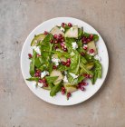 Dandelion salad with pear — Stock Photo