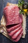 Fresh veal on paper — Stock Photo