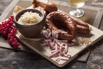 Sauerkraut and bacon strips — Stock Photo