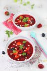Closeup view of berry soup with strawberries, raspberries and blueberries — Stock Photo
