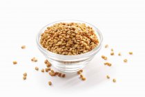 Closeup view of Fenugreek seeds in a glass bowl — Stock Photo