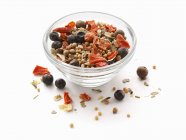 Closeup view of a mixture of preserved spices in a glass bowl — Stock Photo