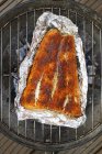 Spiced salmon in aluminium foil — Stock Photo