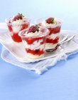 Layered desserts with cream — Stock Photo