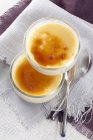 Closeup view of Creme brulee in two glass dishes — Stock Photo