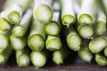 Stack of spears of green asparagus — Stock Photo