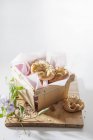 Sweet pretzels in a wooden basket — Stock Photo
