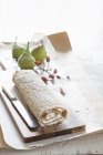 Closeup view of autumnal Swiss roll with pears and cream — Stock Photo