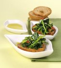 Steamed rapini in bowls — Stock Photo