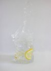 Gin et éclaboussures toniques d'un verre — Photo de stock
