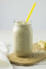 Banana smoothie with oats — Stock Photo