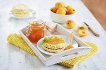 Corn waffles with apricot jam — Stock Photo
