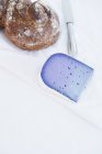 Lavender Gouda and crusty bread — Stock Photo