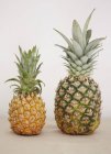 Fresh big and small pineapples — Stock Photo