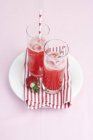 Glasses of raspberry lemonade — Stock Photo