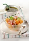 Avocado and salad with strips of ham — Stock Photo