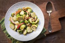 Brussels sprouts with apples — Stock Photo