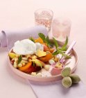 Fruit salad with lemon sorbet — Stock Photo