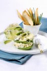 Avocado with Roquefort and onions — Stock Photo